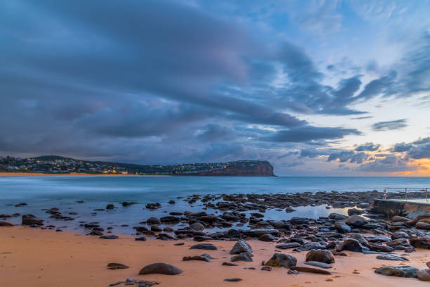 istock Sunrise with scattered rain clouds at the seaside 1485882307