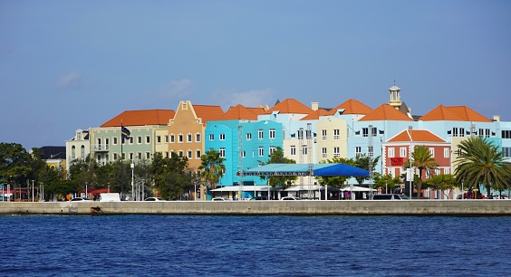 Old city quarter Otrobanda features brightly painted colonial buildings, vivid street art, and a ship-lined waterfront. -Willemstad Curacao