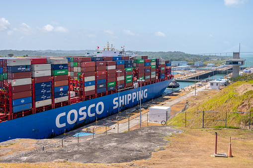 Colon, Panama - April 2, 2023: Views of a container ship at the Agua Clara Locks on the Panama canal.