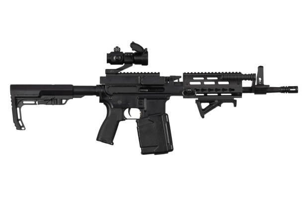 istock Carbine with belt-fed upper receiver that convert AR-15 or M16 from a standard, magazine rifle to light machine gun. Isolated on a white background 1485889162