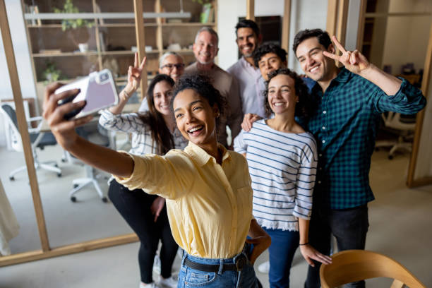 istock Happy business team taking a selfie at the office 1485907911