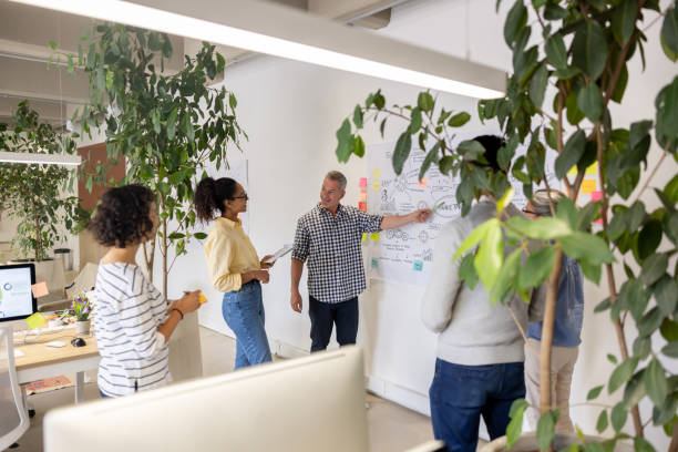 istock Businessman making a presentation to his team at the office 1485907934