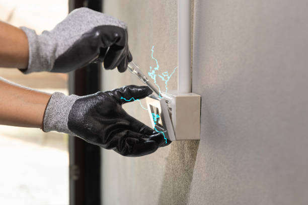 istock Electrician working safely on sockets of a residential electrical system 1485913808