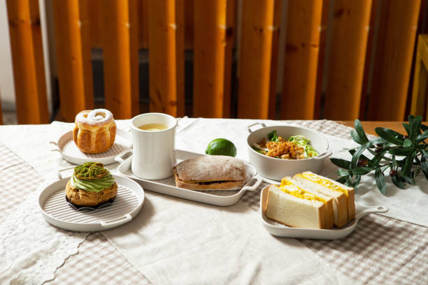 istock Coffee, sandwiches and bread on the table 1485919536