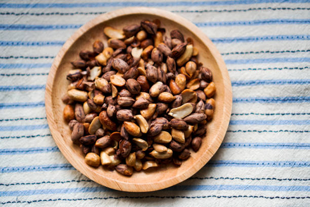 istock A top-view photo shows Tiger Stripe Peanuts lined up on a ready-to-eat plate. 1485921384