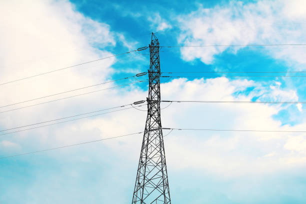 high voltage pole in daylight with cloud sky,electricity distribution station in urban,isolated line of electricity on white background