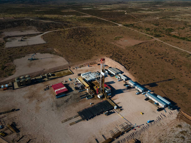 istock Captured from a drone's perspective, a stunning sunset illuminates the Permian Basin's fracking drilling oil rig, showcasing the complex industrial processes at work in the energy sector 1485934550