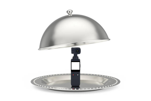 istock Silver Restaurant Cloche with Pocket Handheld Gimbal Action Camera. 3d Rendering 1485938910