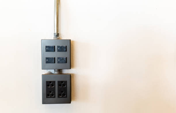 istock Power electric plug and switch, power plug on the wall, Electric power box 1485944680