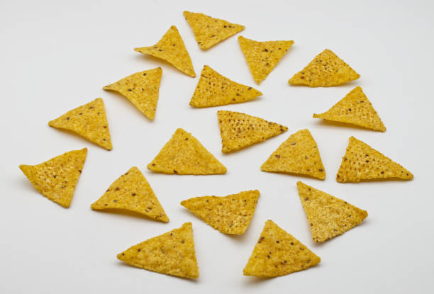 istock Nachos, fresh tortilla chips, isolated on white background. 1485945067