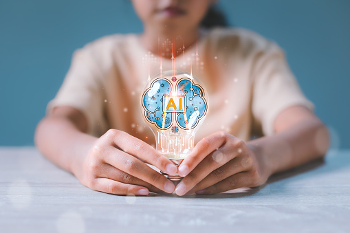 Girl holding light bulb with virtual Artificial Intelligence and virtual digital brain. AI Technology. Searching information data on internet networking, intelligence technology concept.