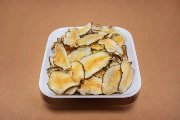 Homemade organic Jerusalem artichoke chips snack.