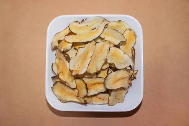 Homemade organic Jerusalem artichoke chips snack.