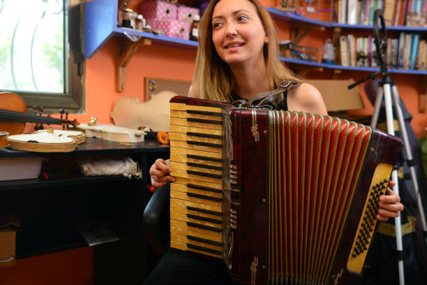 istock A woman plays the accordion 1485966944