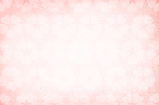 Very light pastel pink colored grunge modern background with abstract pattern of bunches of five hearts making a floral pattern as soft watermark all over. Apt for love greetings, birthday, Women's day, Valentine's Day, wedding anniversary related backdrops, posters, or gift wrapping paper sheet.