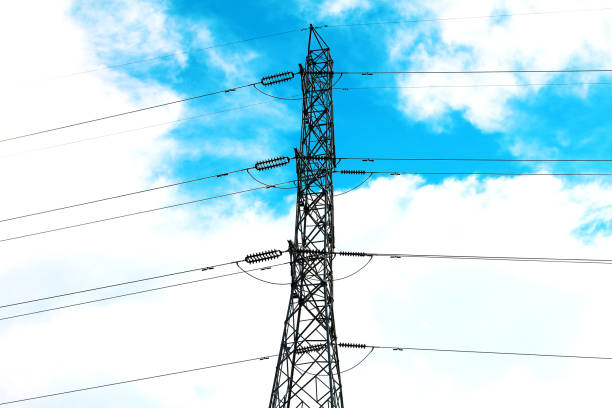 istock high voltage pole in daylight with cloud sky,electricity distribution station in urban,isolated line of electricity on white background 1485967567