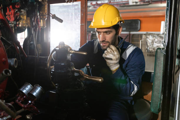 istock Engineer train Inspect the train's diesel engine, railway track in depot of train 1485973672
