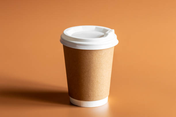 istock Recyclable Craft Disposable Brown Cup with Plastic Lid for Zero Waste Lifestyle. 1485974180