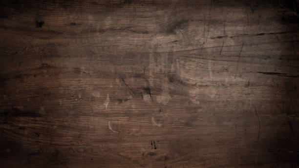 istock Old brown rustic dark grunge wooden timber wall or floor or table texture - wood background banner 1485976451