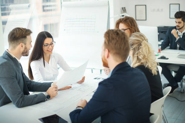 istock Brief business meeting at the office. 1485983371