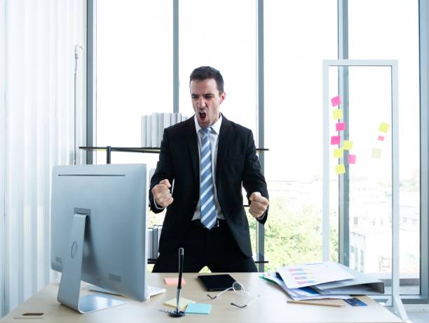 istock Caucasian professional boss man success job achievement while glad and wow expression in front of his desk at the workplace 1485984747