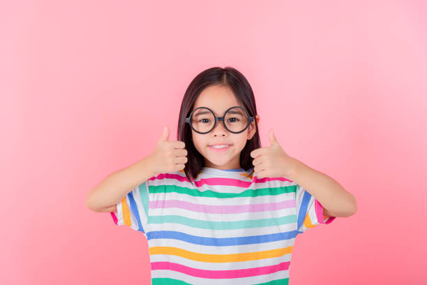 istock Image of Asian child posing on Pink background 1485987227