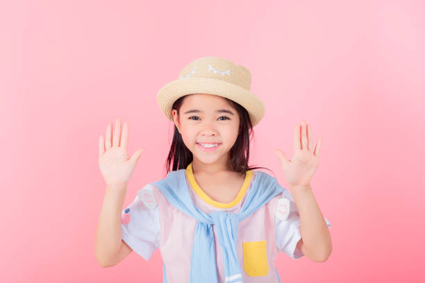 istock Image of Asian child posing on Pink background 1485987294