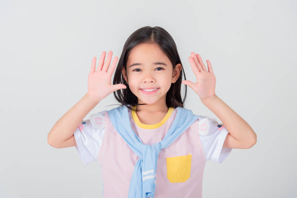 istock Image of Asian child posing on white  background 1485987333