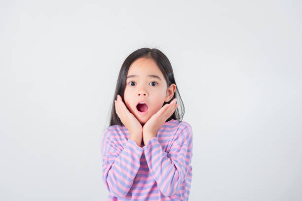istock Image of Asian child posing on white  background 1485987443