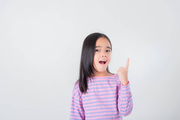 istock Image of Asian child posing on white  background 1485987484