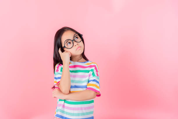 istock Image of Asian child posing on Pink background 1485987525