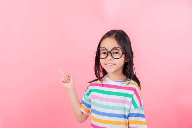 istock Image of Asian child posing on Pink background 1485987530