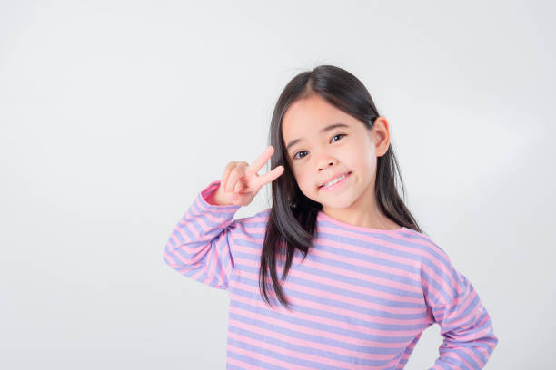 istock Image of Asian child posing on white  background 1485987578