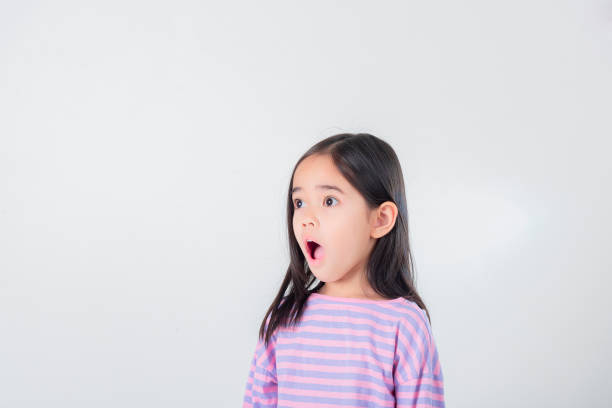istock Image of Asian child posing on white  background 1485987588