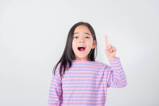 istock Image of Asian child posing on white  background 1485987614