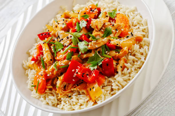 istock sweet and sour chicken with veggies and rice 1485987622