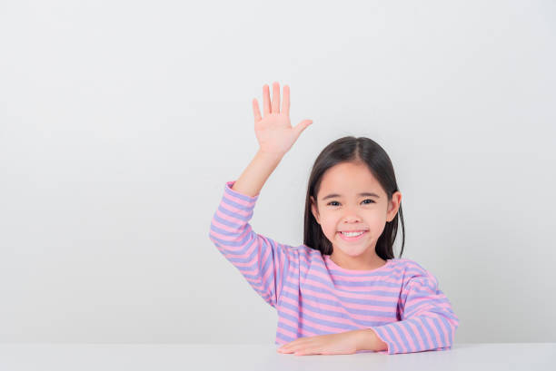 Image of Asian child posing on white  background