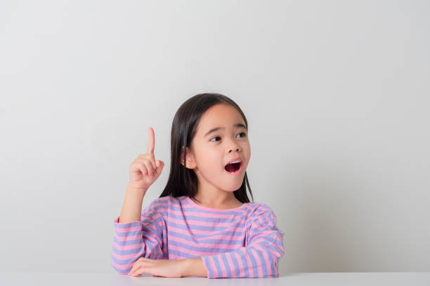 istock Image of Asian child posing on white  background 1485987783