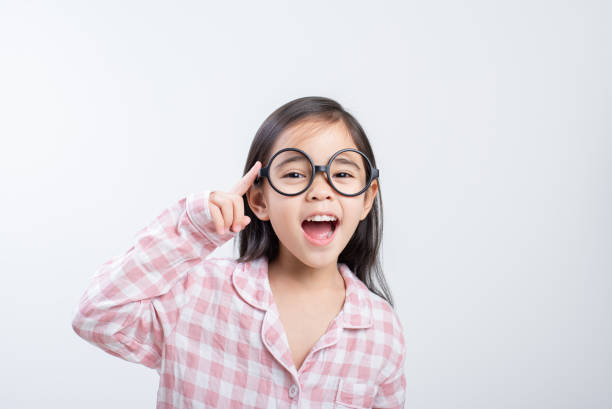 istock little girl asian think white background 1485987893