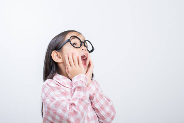 istock little girl asian shocked white background 1485987906