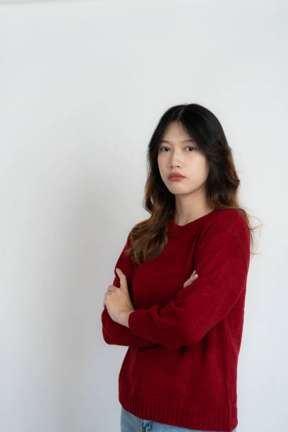 istock Attractive Asian beautiful woman standing on white background and doing hand gestures. 1485994524