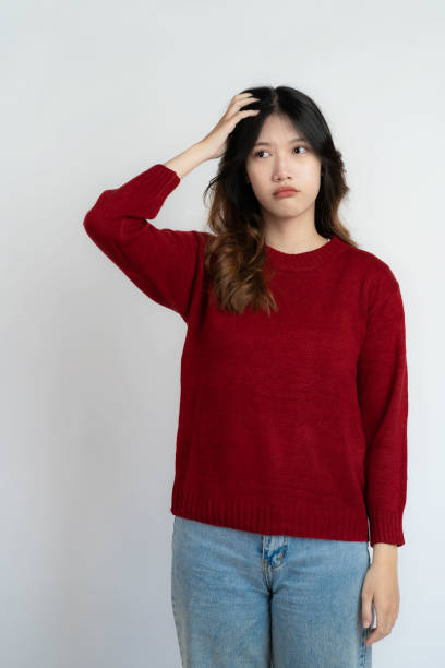 istock Attractive Asian beautiful woman standing on white background and doing hand gestures. 1485994629