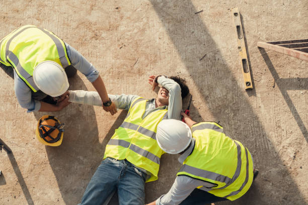 istock Builder accident fall scaffolding to concrete floor, Safety team help employee accident. top view 1485996877
