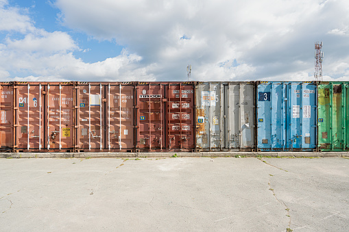 Novosibirsk Russia- September 20, 2022: Handling stack of container shipping, Container shipping yard.