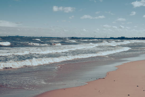 istock Baltic sea Dark blue clouds and sea or ocean water surface with foam waves before storm, dramatic seascape background sunsets. Abstract pattern texture. 1485998805
