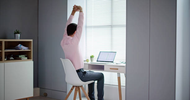 istock Happy Young Businessman Stretching His Arms 1485998885