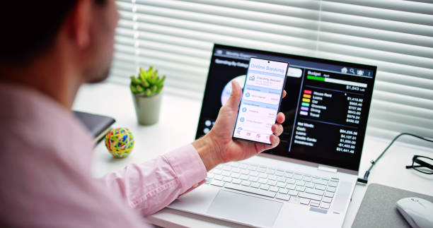 istock Businessman Using Online Banking Service On Phone 1485998908