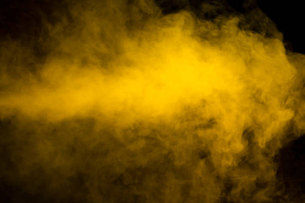 istock Yellow steam on a black background. 1486004090