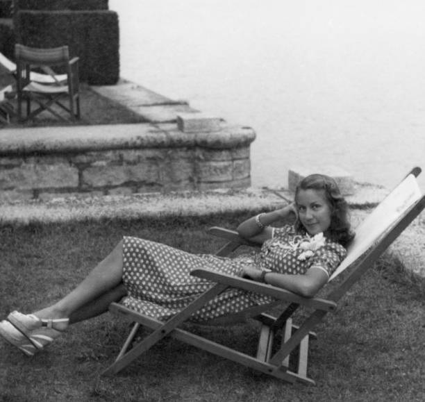 istock Young Woman on lakeshore, 1941. 1486006693