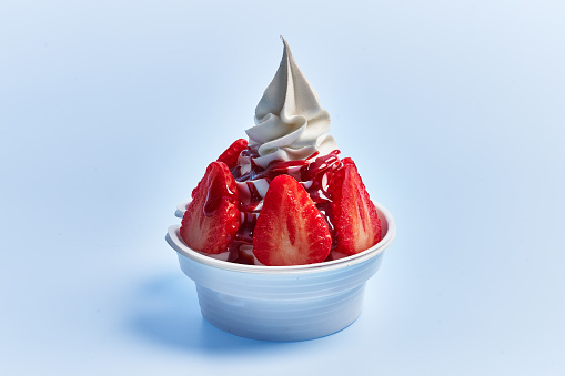 SIngle strawberry ice cream over white isolated background